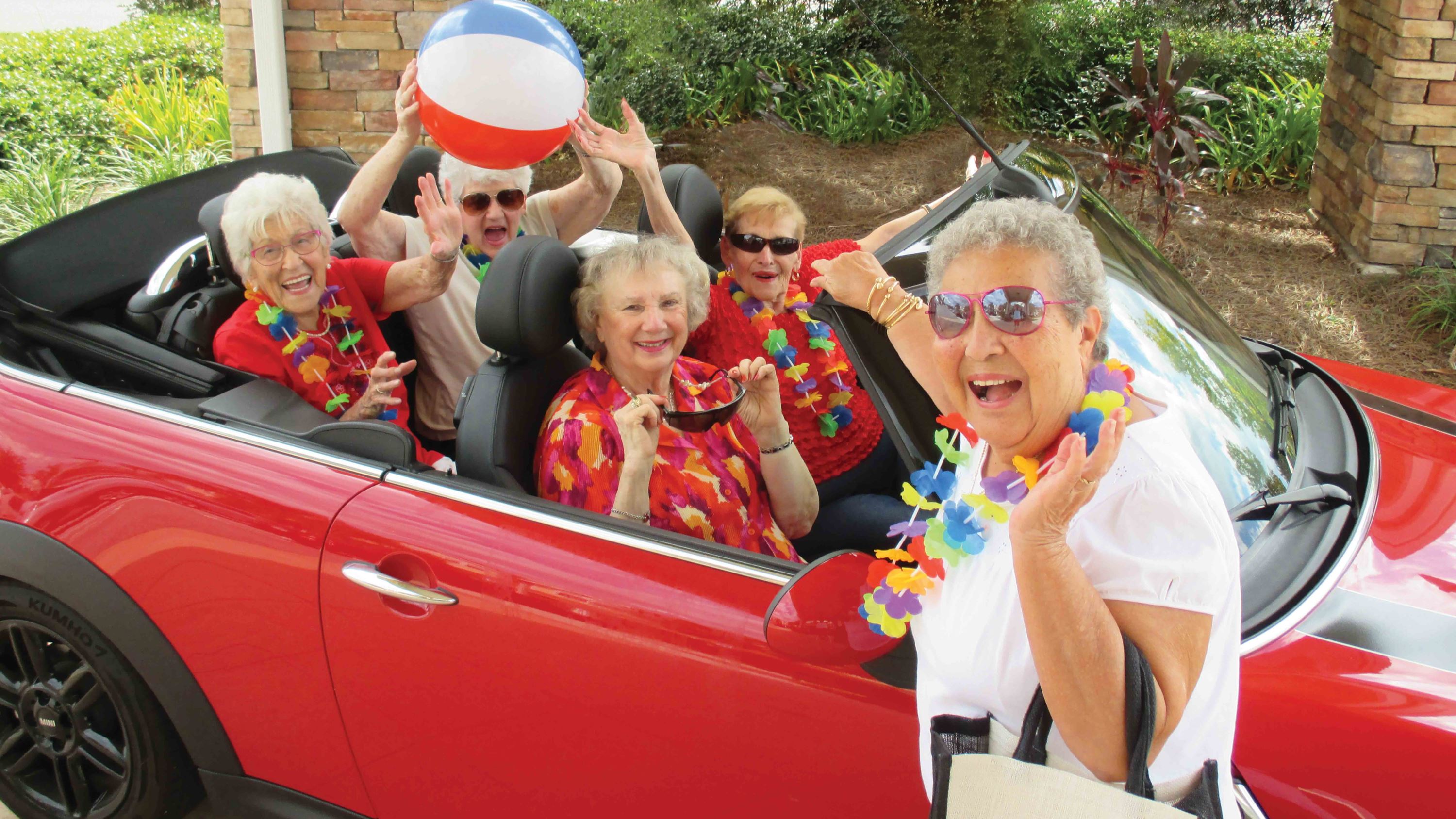 Sanford Estates-Women-In-Red-Car