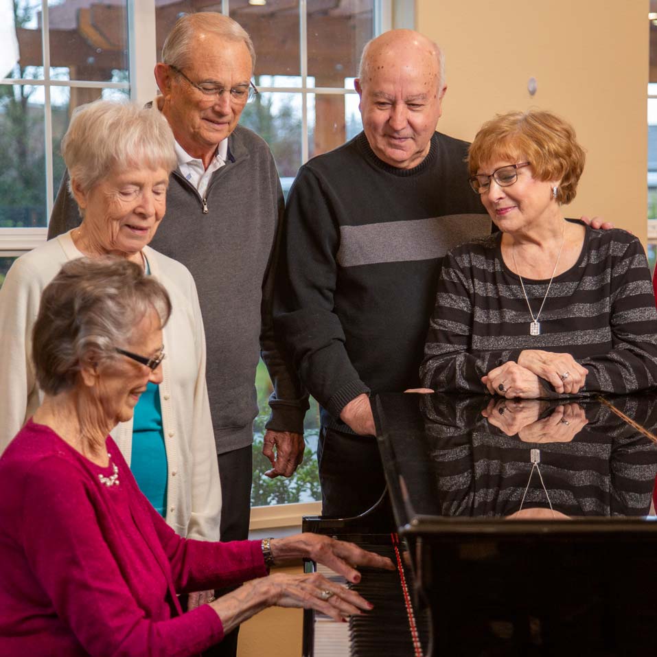 Sanford Estates seniors playing piano